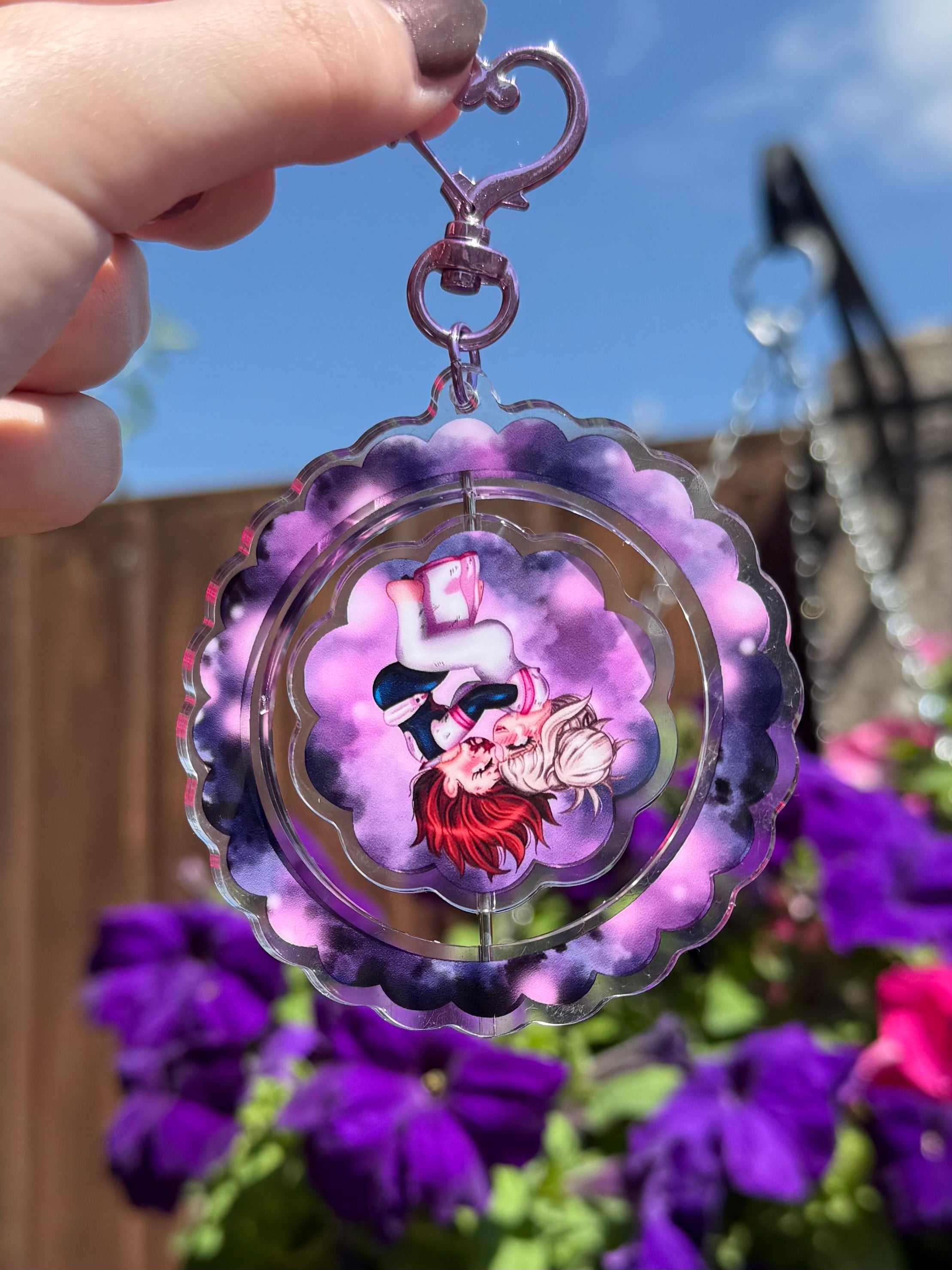 The cutest girls in the world spinning keyring